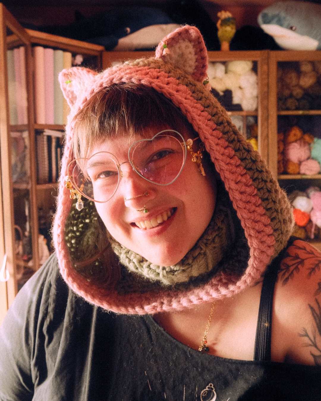 person wearing crochet cat hood with ears