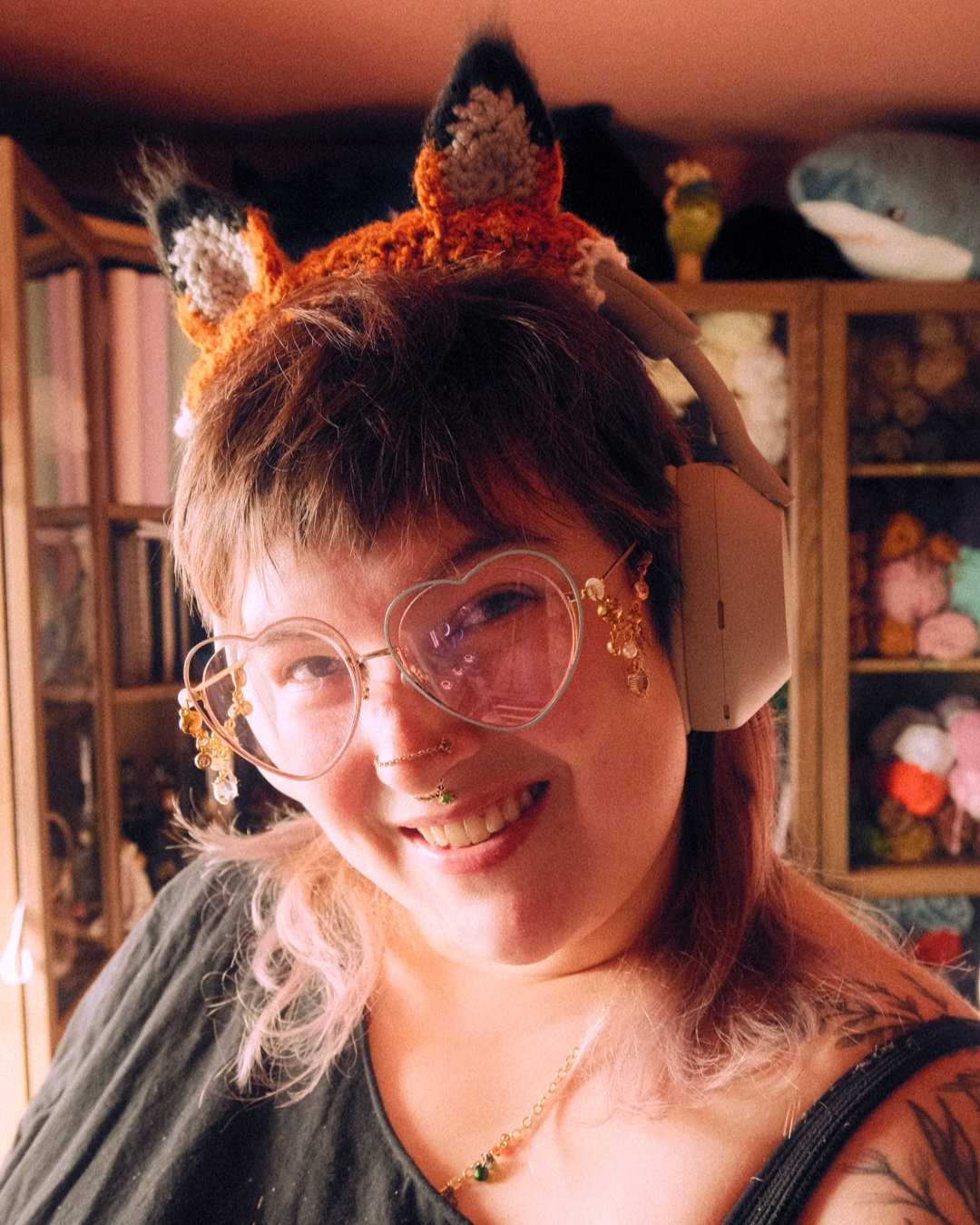 person wearing headphones with fox ears attached