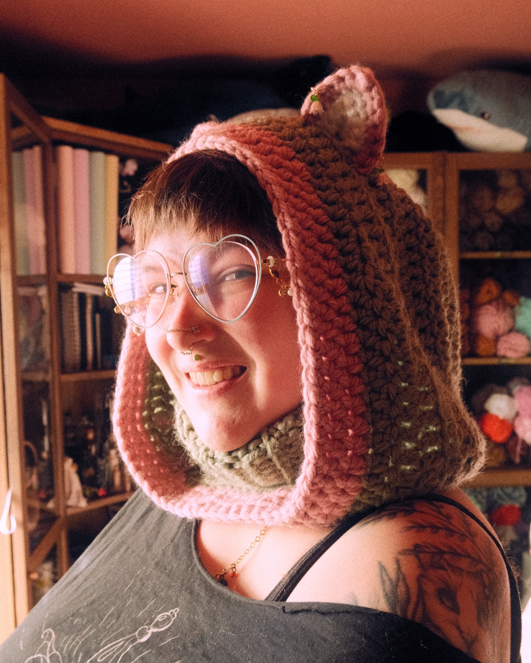person wearing crochet cat hood with ears