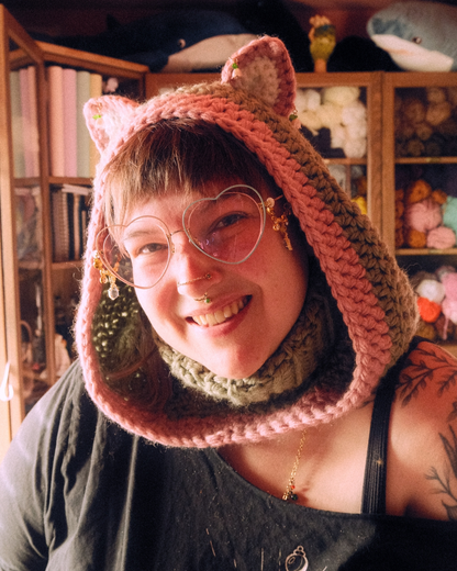 person wearing crochet cat hood with ears